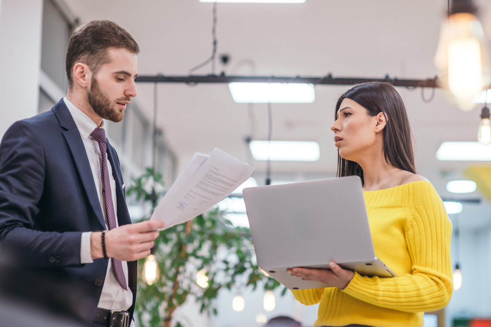 man and woman discussing virtual mailroom